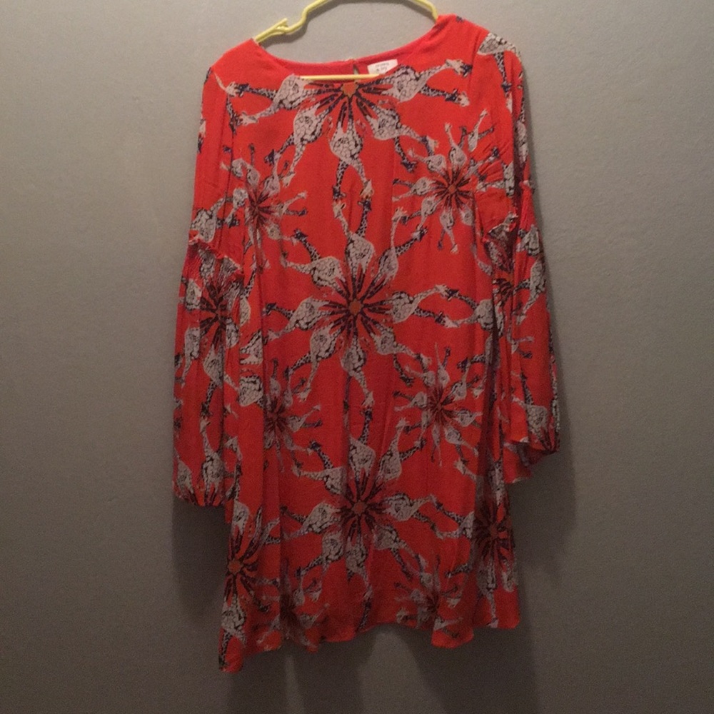 Orange, black and white dress with giraffes